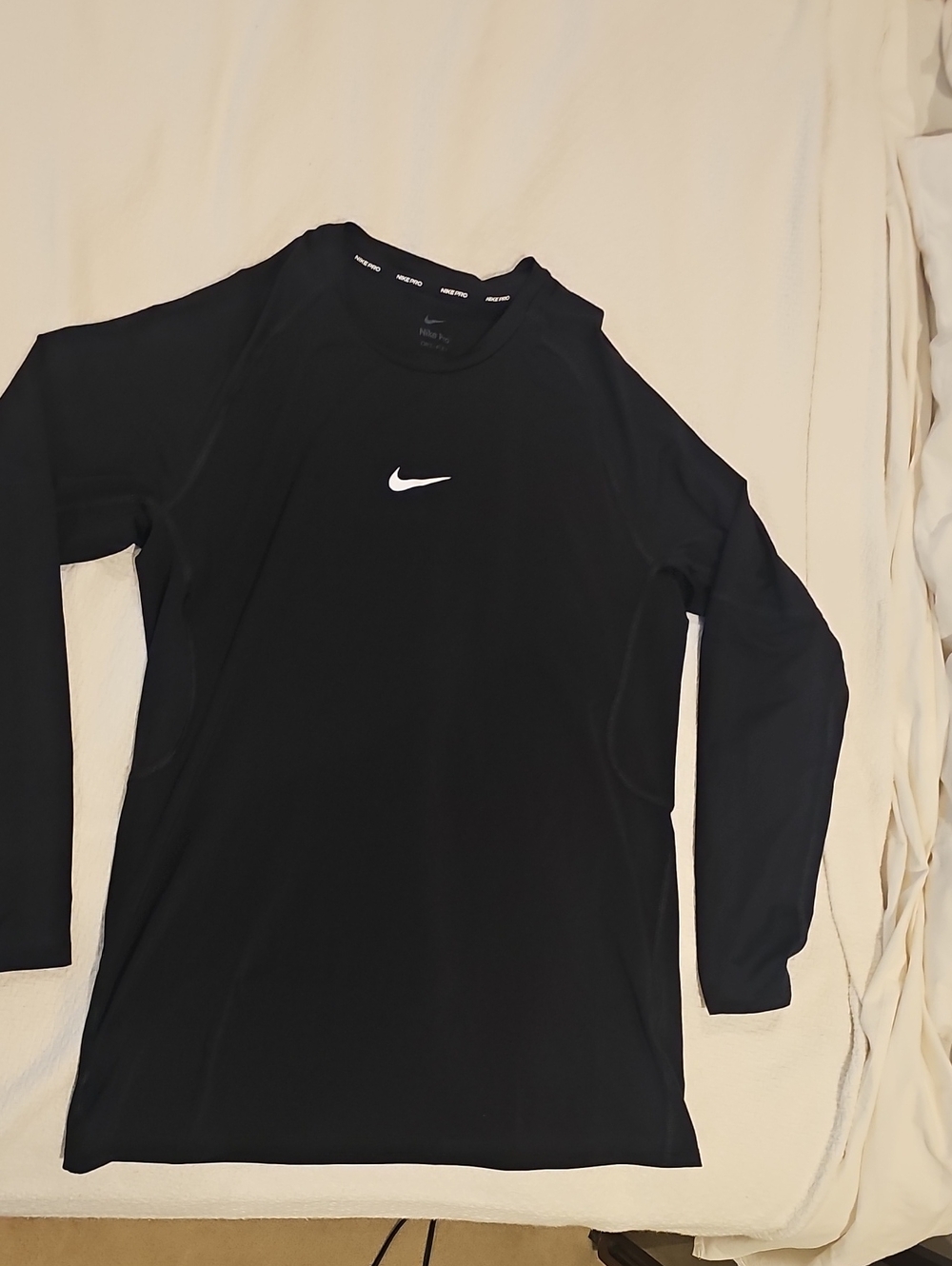 Nike Black Long Sleeve Athletic Top with White Swoosh